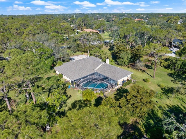 bird's eye view featuring a view of trees