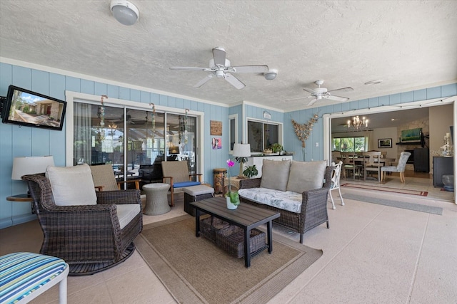 view of patio with ceiling fan and outdoor lounge area