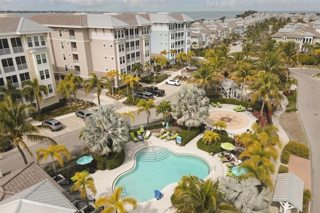 view of pool with a residential view