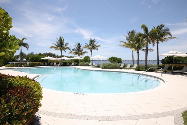 community pool featuring a patio area