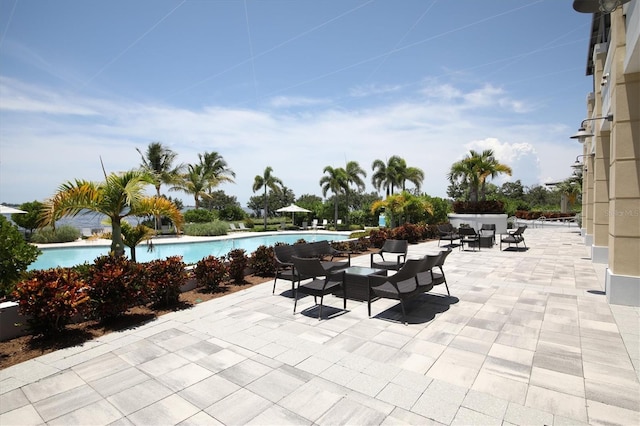 view of patio / terrace featuring a community pool