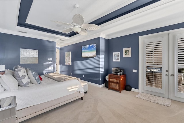 bedroom with a raised ceiling, access to outside, carpet, baseboards, and ceiling fan