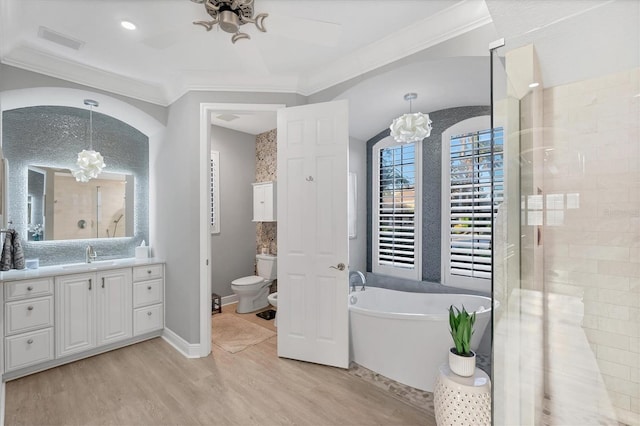 full bathroom with vanity, wood finished floors, visible vents, crown molding, and a chandelier