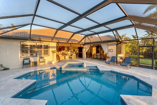 view of pool featuring a patio area and a pool with connected hot tub