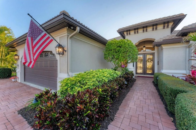 view of front of property featuring french doors and stucco siding