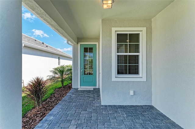 995 Waterline Ct, Sarasota, FL 34240 - property entrance featuring stucco siding