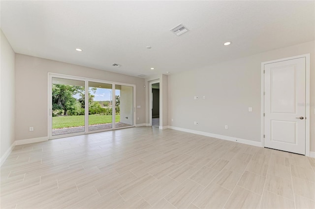 995 Waterline Ct, Sarasota, FL 34240 - empty room featuring baseboards, visible vents, and recessed lighting