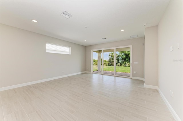 995 Waterline Ct, Sarasota, FL 34240 - spare room with recessed lighting, visible vents, and baseboards