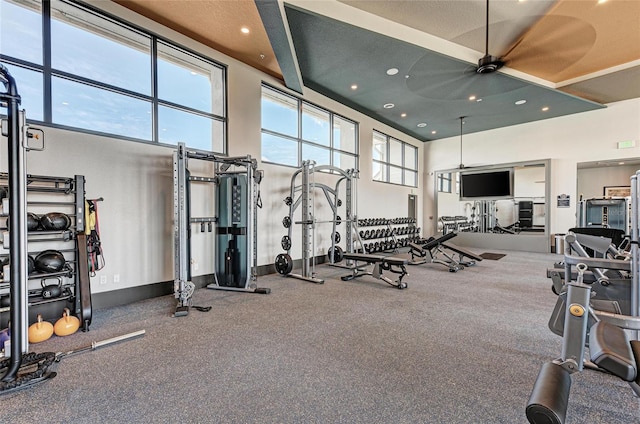 995 Waterline Ct, Sarasota, FL 34240 - exercise room with ceiling fan, a high ceiling, baseboards, and recessed lighting