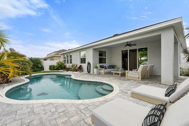 view of swimming pool featuring ceiling fan, fence, an outdoor living space, a fenced in pool, and a patio area