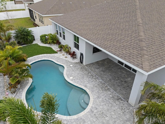 view of pool featuring a patio area, a fenced backyard, and a fenced in pool