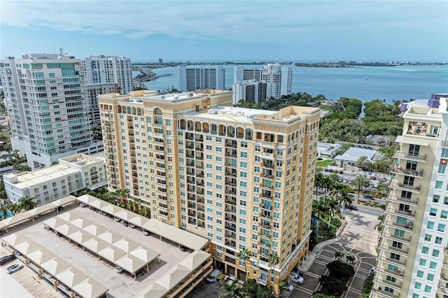 bird's eye view featuring a water view and a view of city