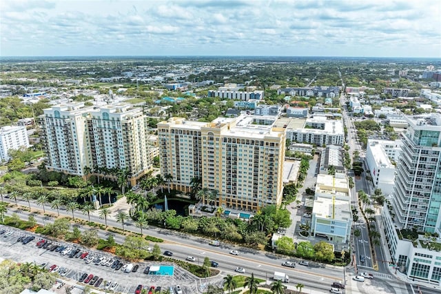 birds eye view of property featuring a city view