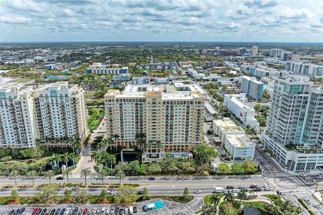 birds eye view of property with a city view