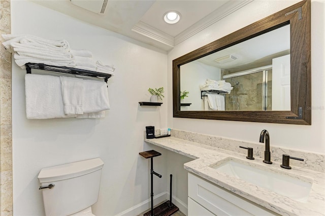 full bath with a stall shower, visible vents, toilet, ornamental molding, and vanity