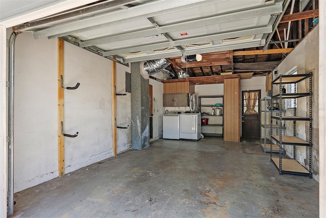 garage with washing machine and dryer