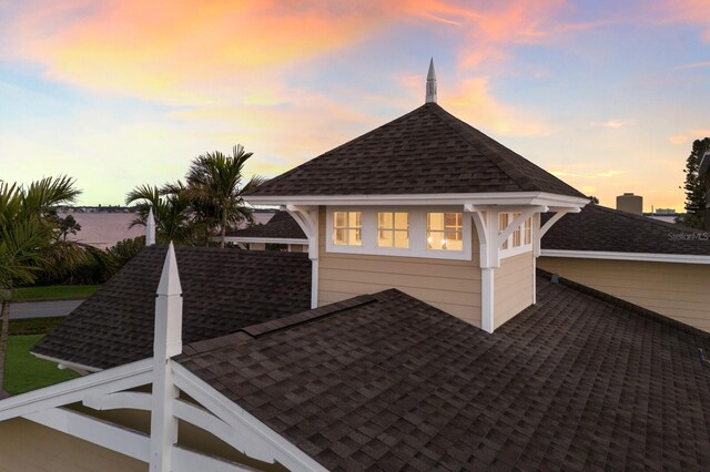 exterior details with a shingled roof