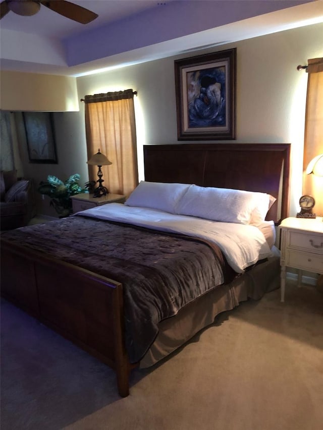 bedroom featuring carpet flooring and a ceiling fan