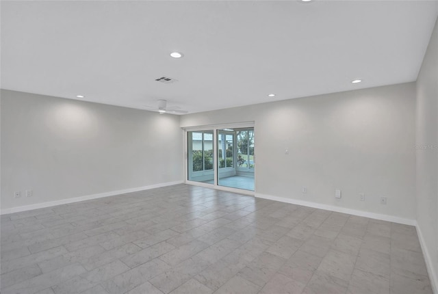 spare room with recessed lighting, visible vents, baseboards, and ceiling fan