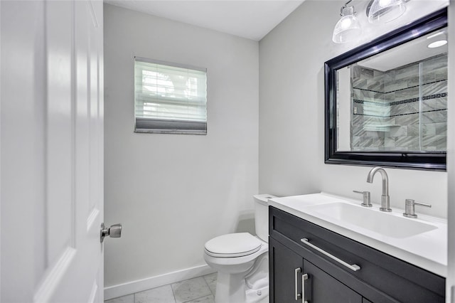 bathroom with vanity, baseboards, a shower, toilet, and marble finish floor