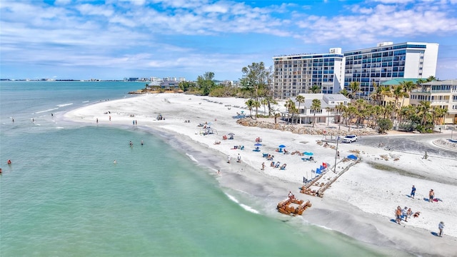 bird's eye view with a view of the beach and a water view