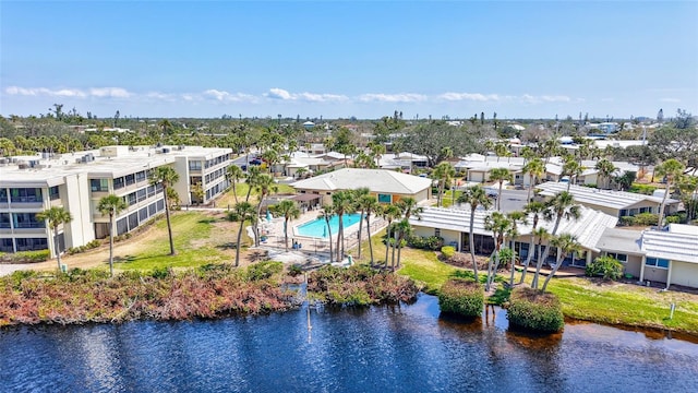 birds eye view of property featuring a water view