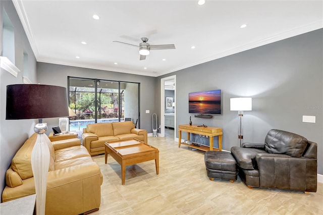 living area with ornamental molding, recessed lighting, baseboards, and a ceiling fan