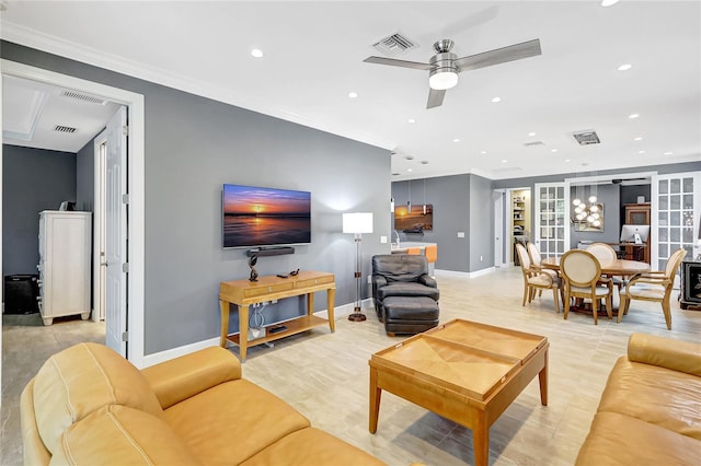 living room with recessed lighting, visible vents, and ornamental molding