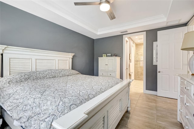 bedroom with light tile patterned floors, visible vents, ceiling fan, ornamental molding, and a tray ceiling