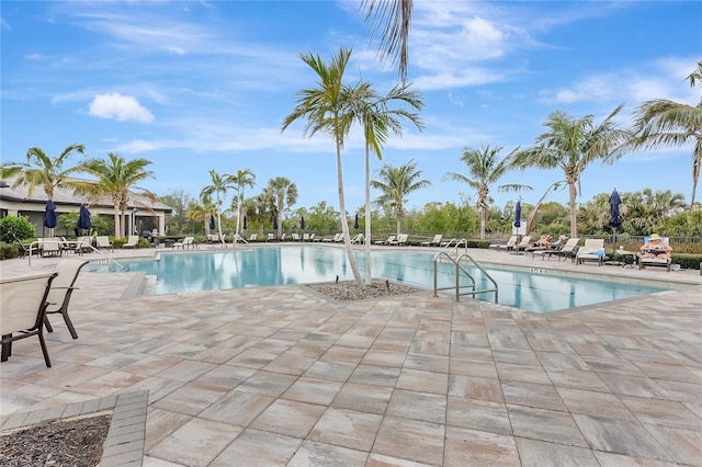 community pool with a patio