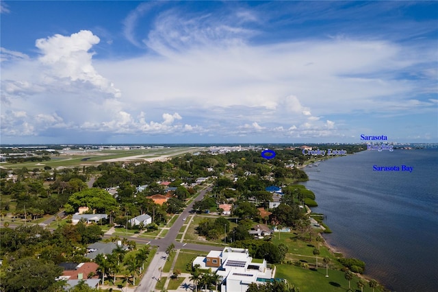 drone / aerial view with a water view