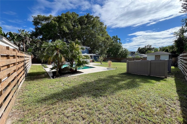 view of yard featuring a fenced backyard and a fenced in pool