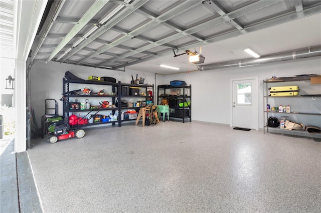 garage featuring a garage door opener