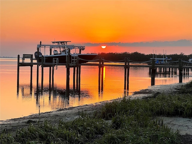 view of dock with a water view and boat lift