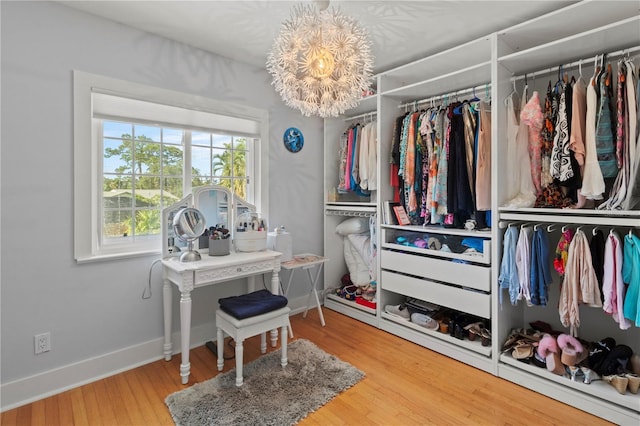 7735 Westmoreland Dr, Sarasota, FL 34243 - spacious closet with wood finished floors
