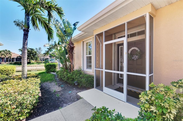 exterior space with stucco siding