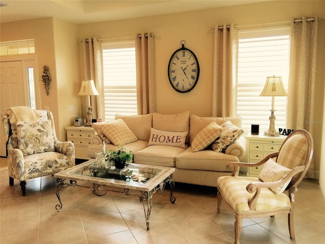 living room with tile patterned floors