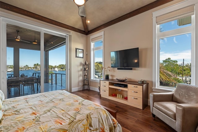 bedroom with a water view, access to outside, baseboards, and dark wood finished floors