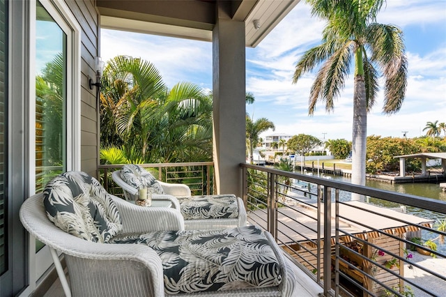 balcony featuring a water view