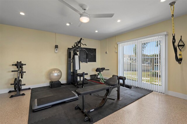 exercise room with a ceiling fan, recessed lighting, and baseboards