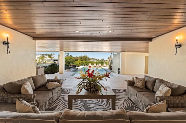 interior space featuring a textured wall, wooden ceiling, and recessed lighting