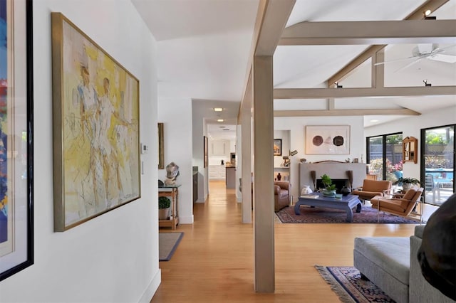 1610 S Lake Shore Dr, Sarasota, FL 34231 - interior space featuring vaulted ceiling with beams and light wood-type flooring