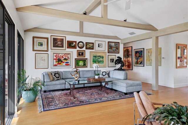 1610 S Lake Shore Dr, Sarasota, FL 34231 - living room with visible vents, baseboards, lofted ceiling with beams, wood finished floors, and a ceiling fan