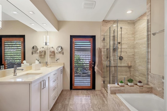 1610 S Lake Shore Dr, Sarasota, FL 34231 - full bath with a shower stall, a garden tub, and a sink
