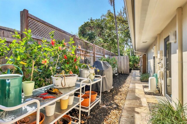 1610 S Lake Shore Dr, Sarasota, FL 34231 - view of patio / terrace with a fenced backyard and grilling area