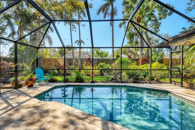 1610 S Lake Shore Dr, Sarasota, FL 34231 - view of pool with glass enclosure, a patio, and a fenced in pool
