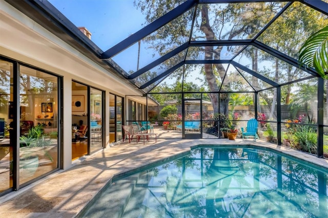 1610 S Lake Shore Dr, Sarasota, FL 34231 - view of swimming pool featuring glass enclosure, a patio, and fence