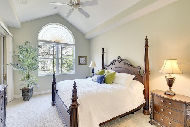 bedroom with ceiling fan, baseboards, vaulted ceiling, and light colored carpet