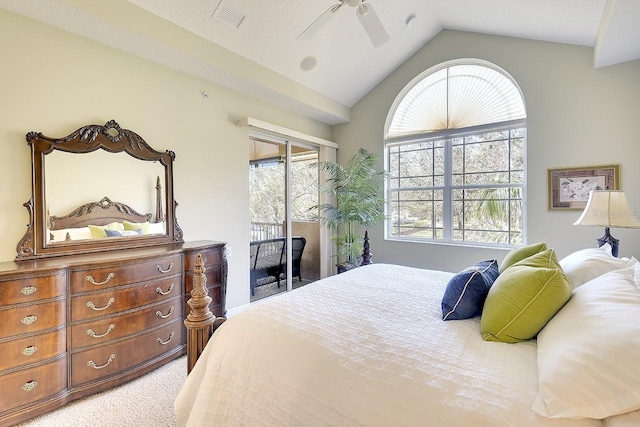 bedroom with access to exterior, carpet, multiple windows, and visible vents