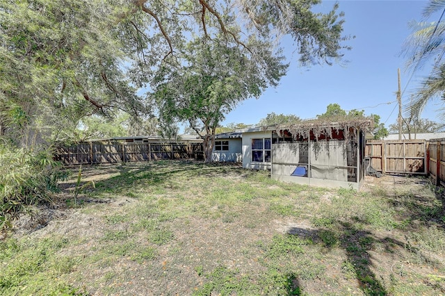 view of yard featuring a fenced backyard